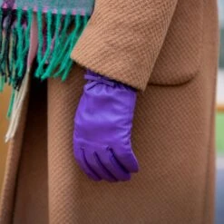 Women’s Wool-Lined Leather Gloves With Quilted Cuffs And Bow -Dents womens leather gloves with quilted cuffs amethyst